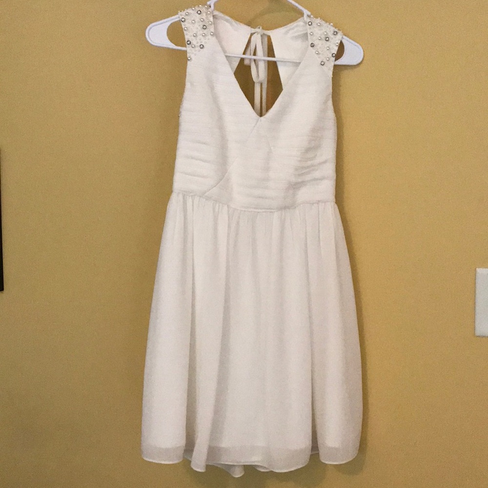 White open back dress. Perfect for brides!